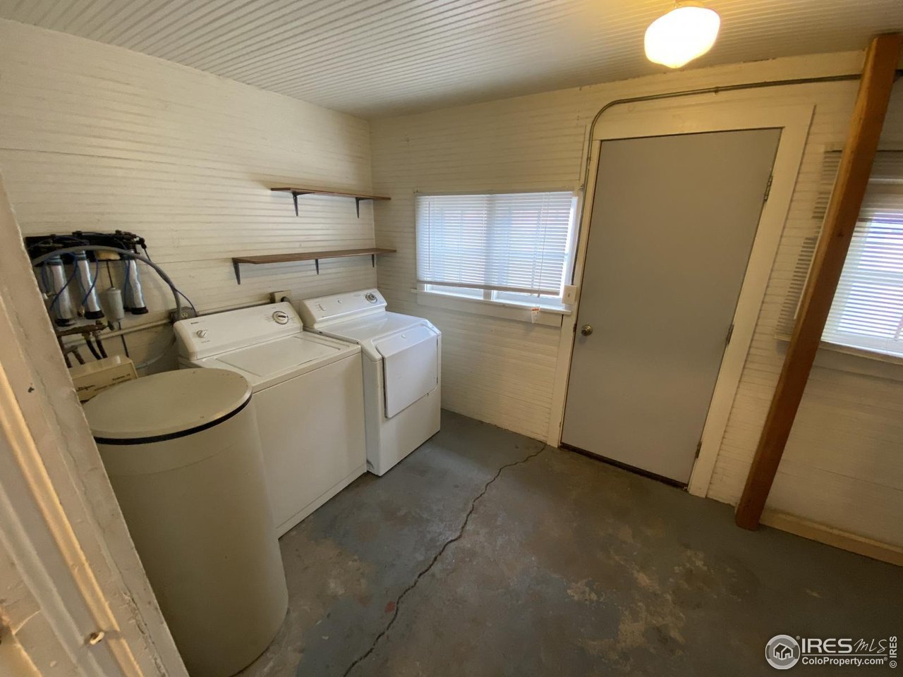 303 South 2nd Street Sterling, CO 80751 - Photo 23 of 37 a bathroom with a sink toilet and mirror
