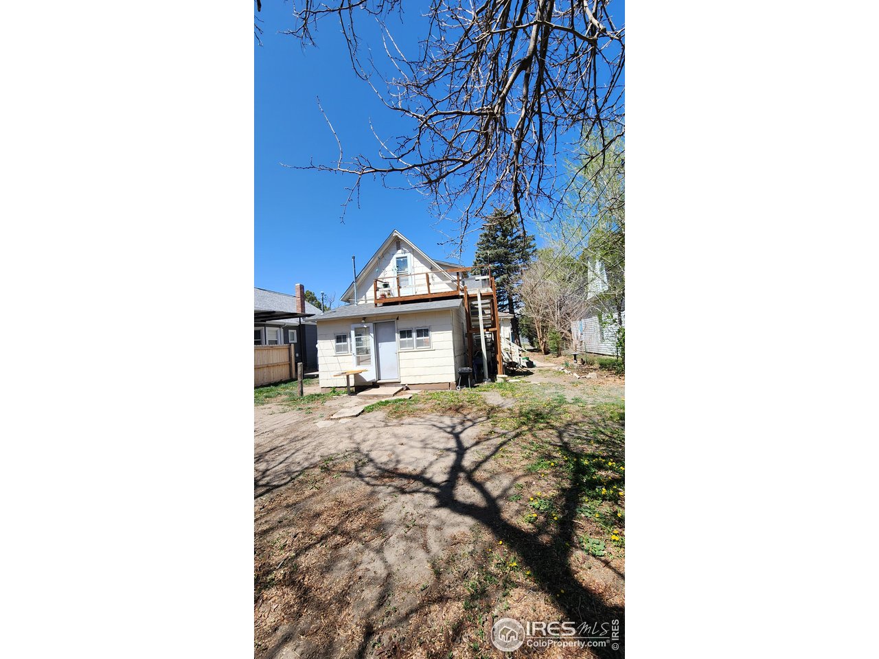 303 South 2nd Street Sterling, CO 80751 - Photo 26 of 37 a view of a house with a yard