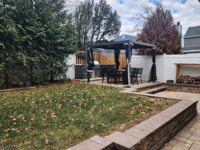 31 Sherman Avenue Hawthorne, NJ 07506 - Photo 18 of 23 a view of a swimming pool with a patio