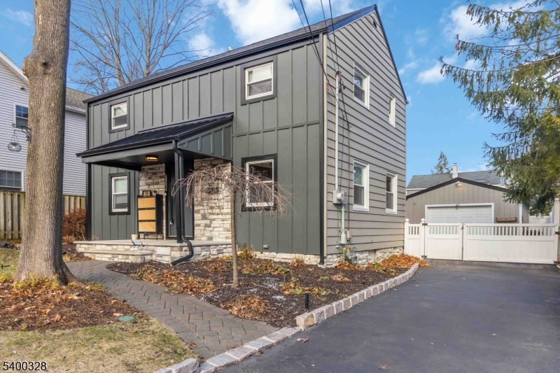 31 Sherman Avenue Hawthorne, NJ 07506 - Photo 2 of 23 a front view of a house with a outdoor space