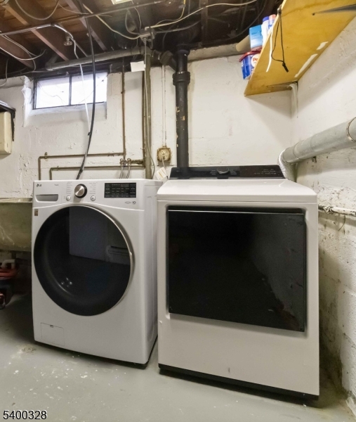 31 Sherman Avenue Hawthorne, NJ 07506 - Photo 21 of 23 a utility room with dryer and washer