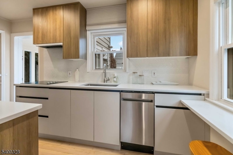 31 Sherman Avenue Hawthorne, NJ 07506 - Photo 7 of 23 a bathroom with a sink and a mirror