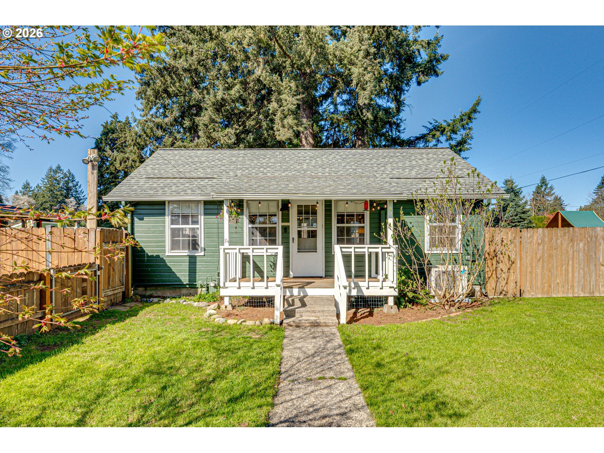 565 9th Street Washougal, WA 98671 - Photo 1 of 24 a house view with a garden space