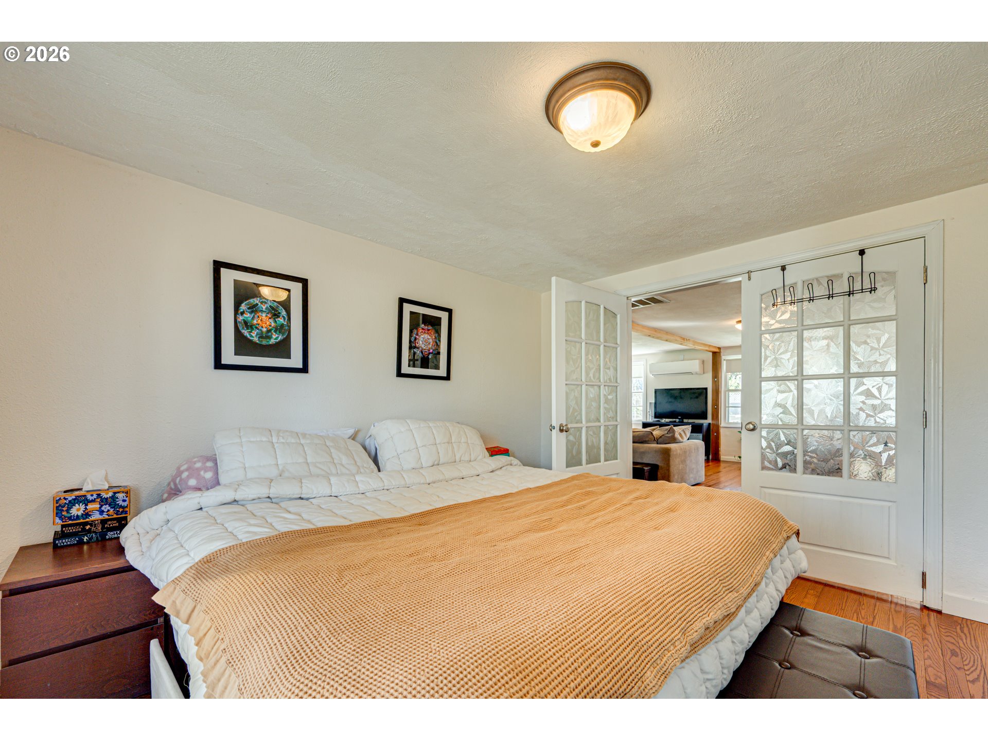 565 9th Street Washougal, WA 98671 - Photo 14 of 24 a bedroom with a bed and a large mirror