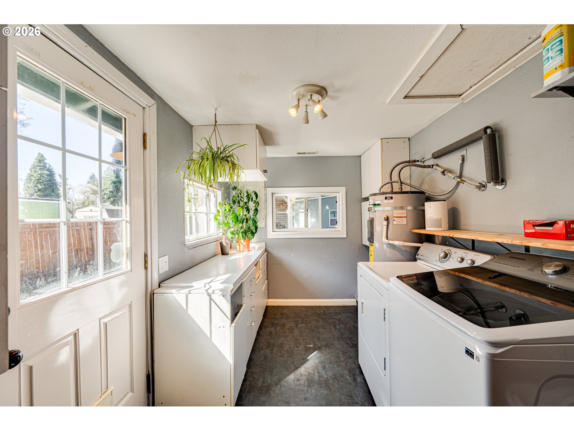 565 9th Street Washougal, WA 98671 - Photo 17 of 24 a kitchen that has a sink and a stove