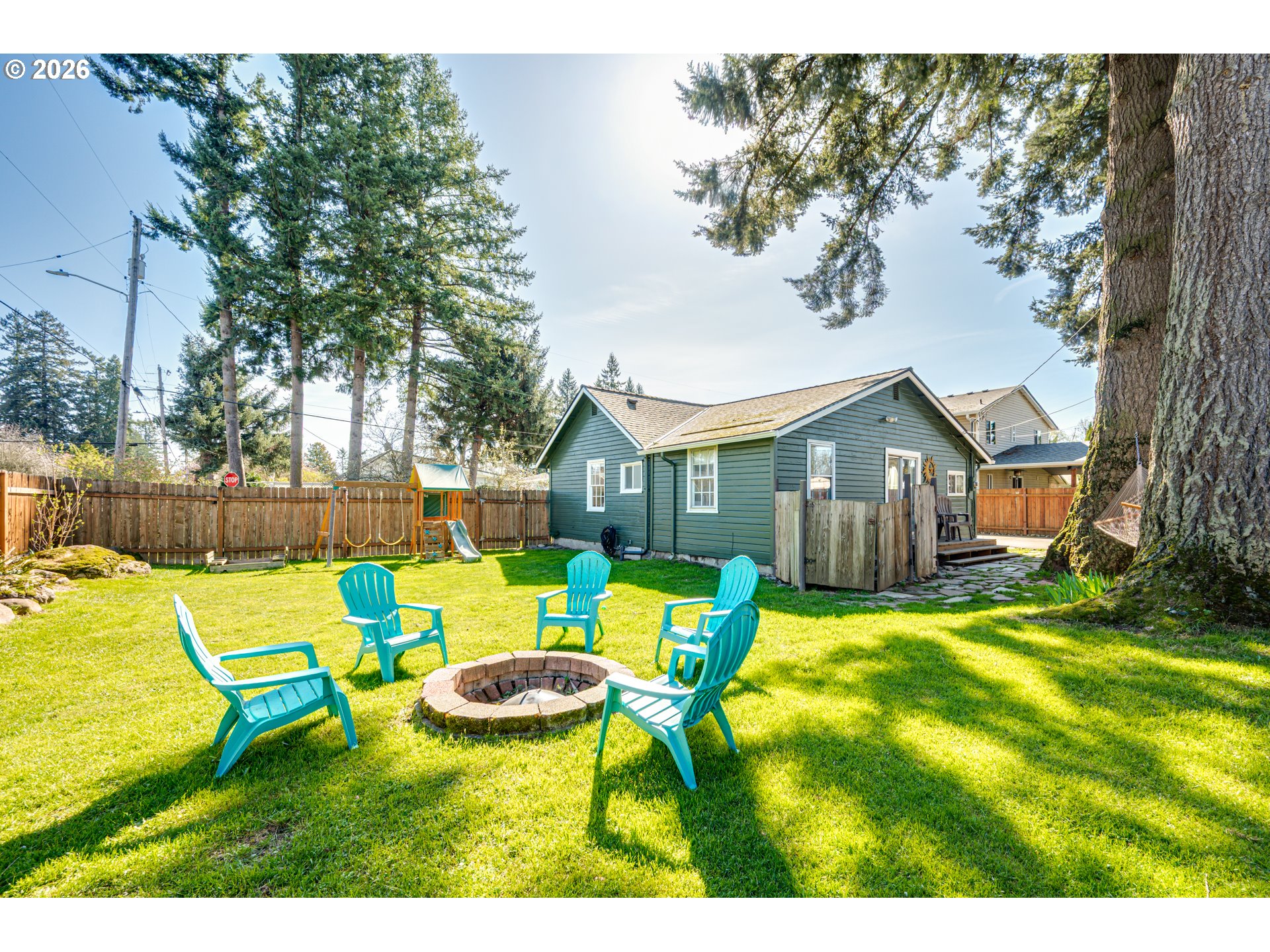 565 9th Street Washougal, WA 98671 - Photo 18 of 24 a view of backyard of house with seating space
