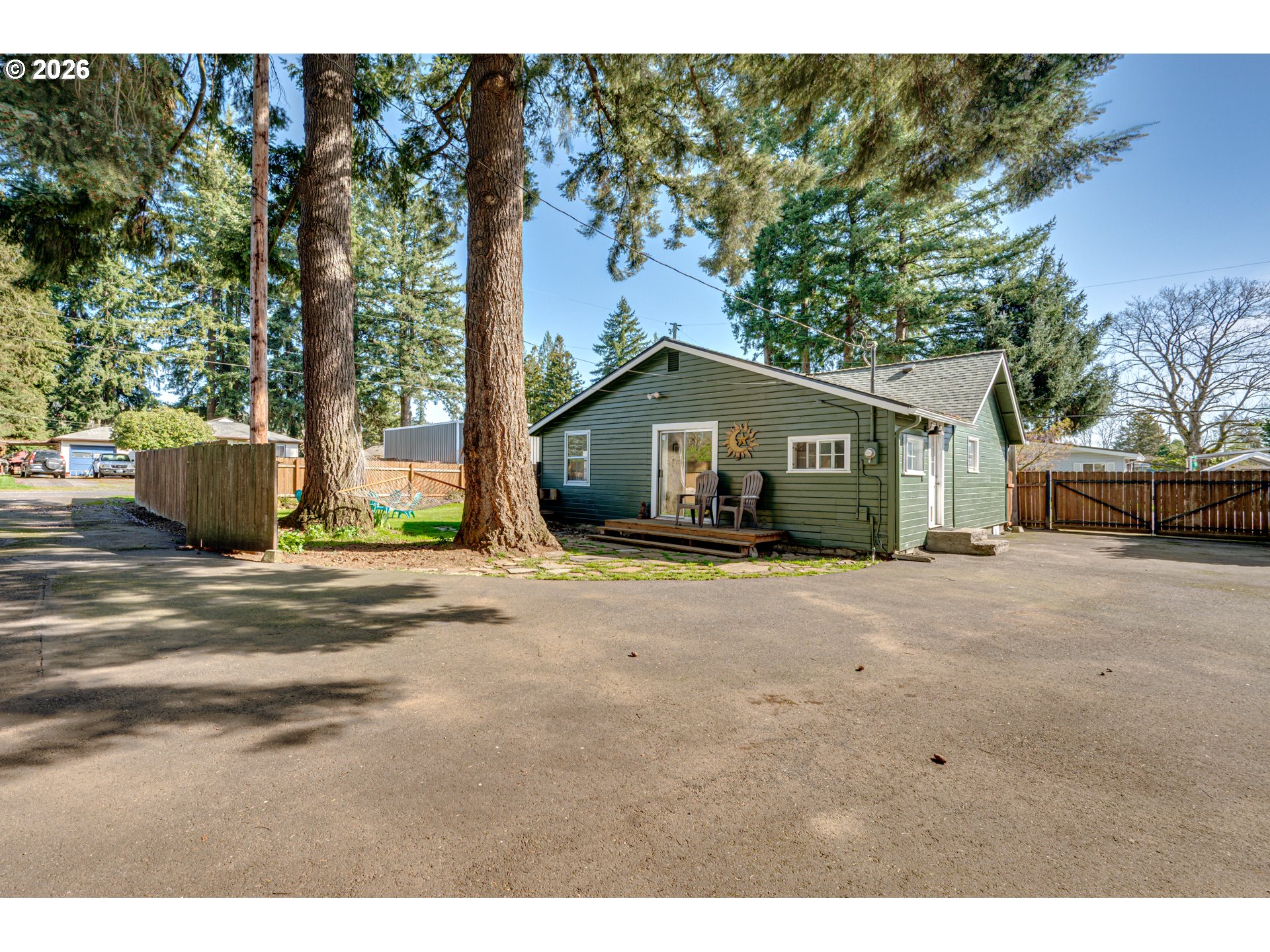 565 9th Street Washougal, WA 98671 - Photo 23 of 24 a front view of a house with a garden