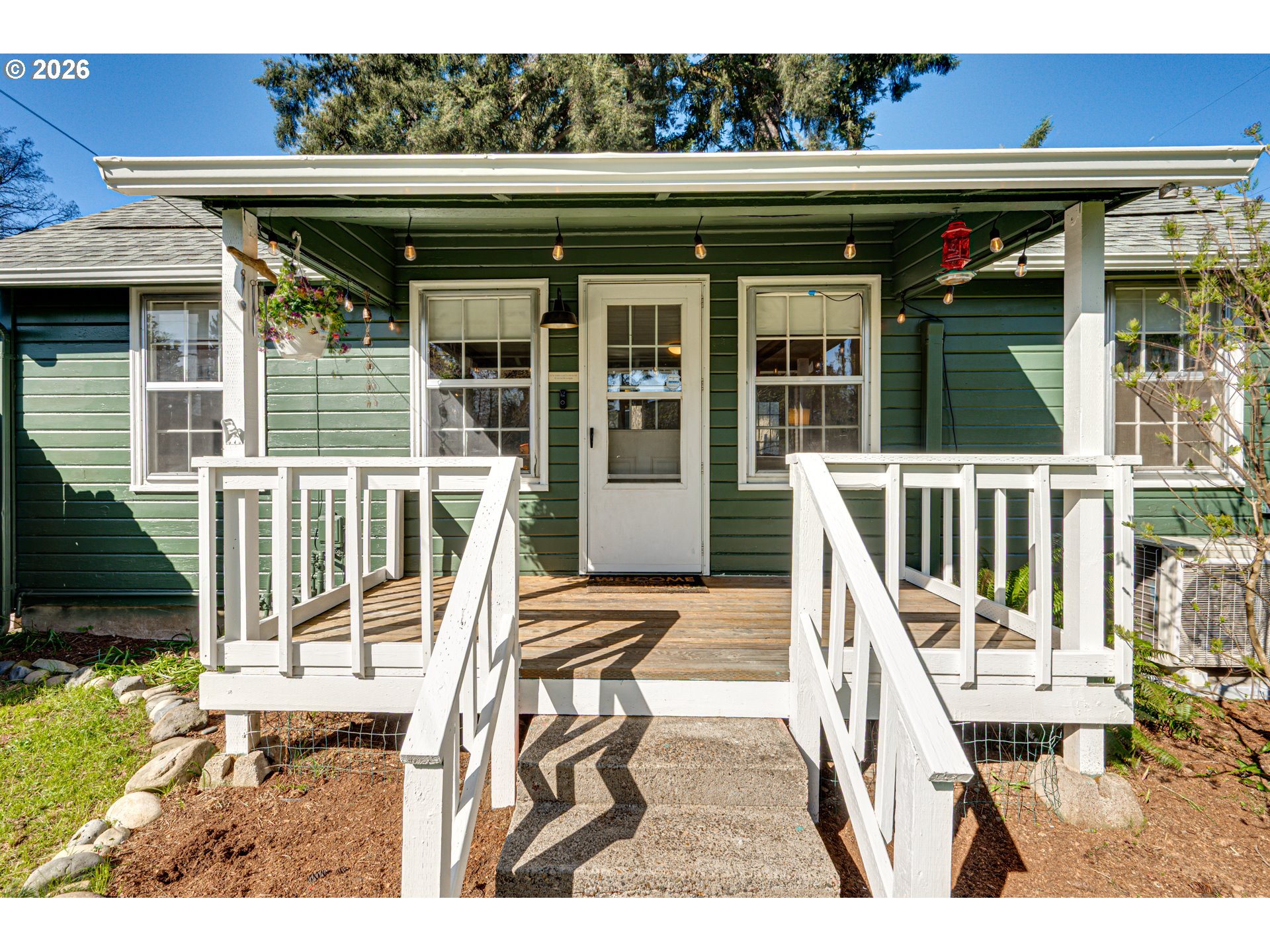 565 9th Street Washougal, WA 98671 - Photo 3 of 24 a view of deck with a chair and swing