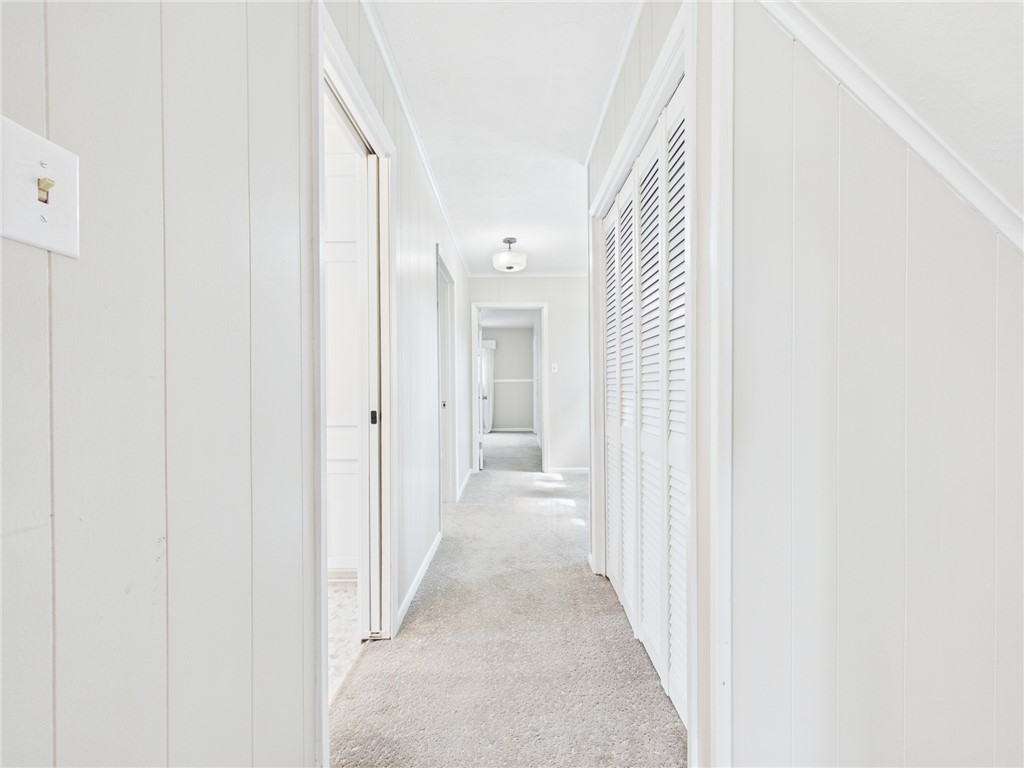 902 Briar Bend Court Bryan, TX 77802 - Photo 22 of 39 a view of a hallway with a white walls