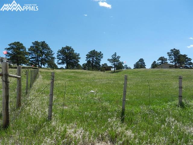 16555 Bar X Road Colorado Springs, CO 80908 - Photo 35 of 36 This is your fence line on the left of this picture. It's taken about 600' north of the previous picture. It's from the north-west corner of the property torwards the barn and the home.