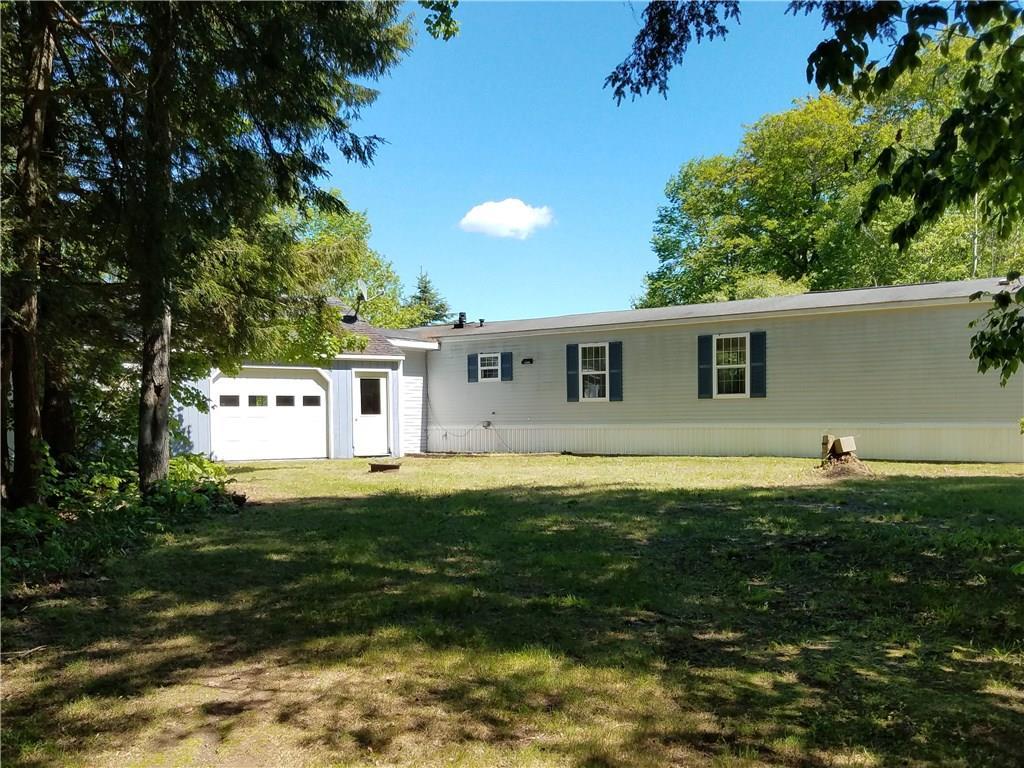 165 Webster Road Farmington, ME 04938 - Photo 3 of 27 Back of home. Garage has front and...