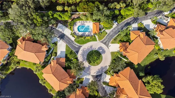 an aerial view of a house outdoor space and street view
