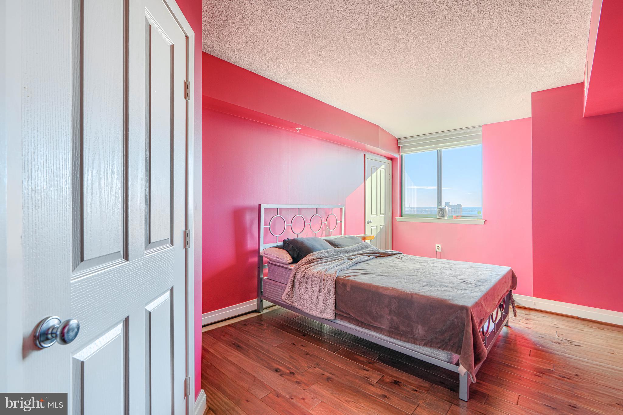 414 Water Street, Unit 2701 Baltimore, MD 21202 - Photo 10 of 24 Primary Bedroom