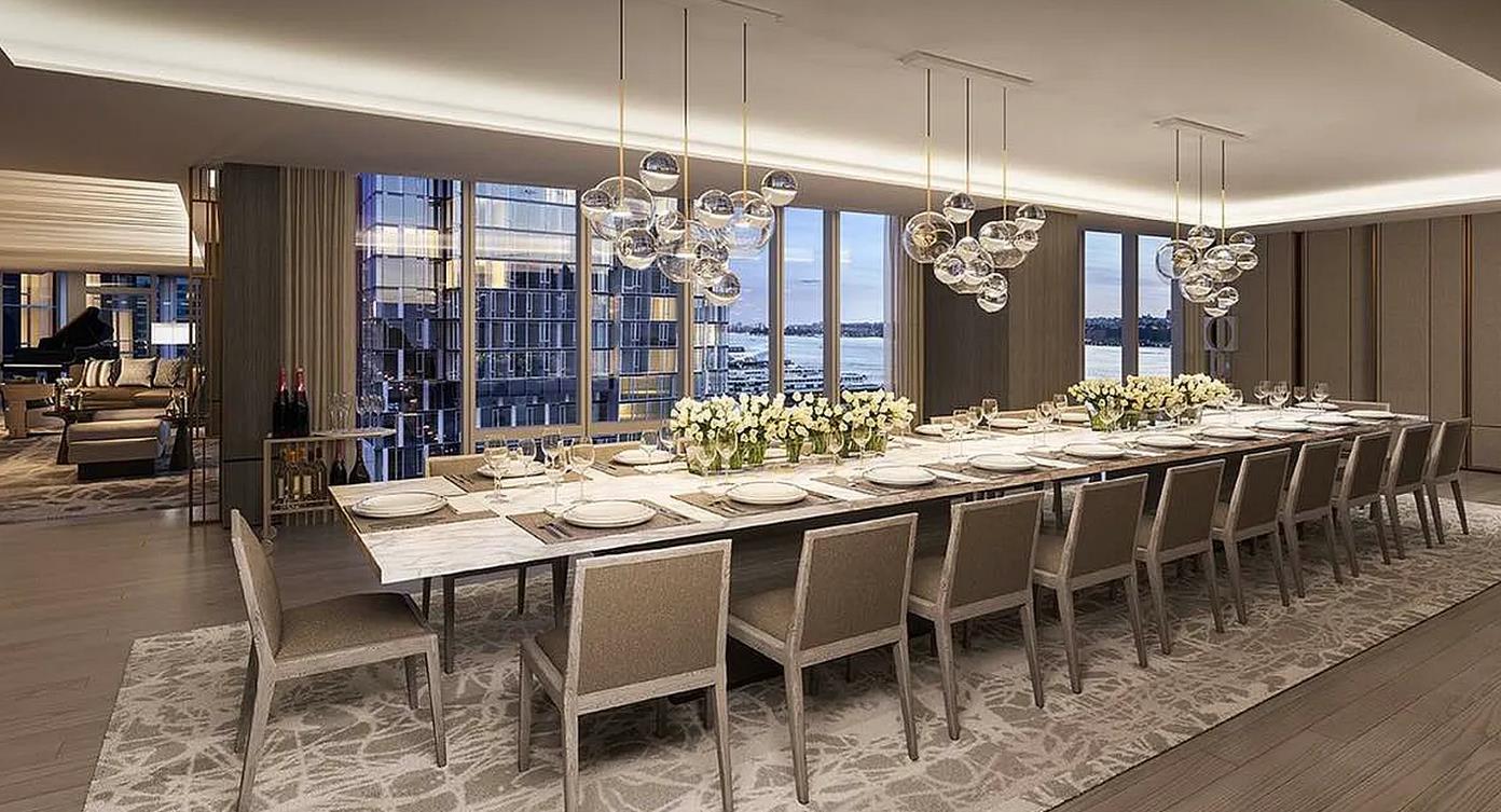 30 Riverside Boulevard, Unit 29D Manhattan, NY 10069 - Photo 13 of 25 a dining room with stainless steel appliances kitchen island granite countertop a table and chairs