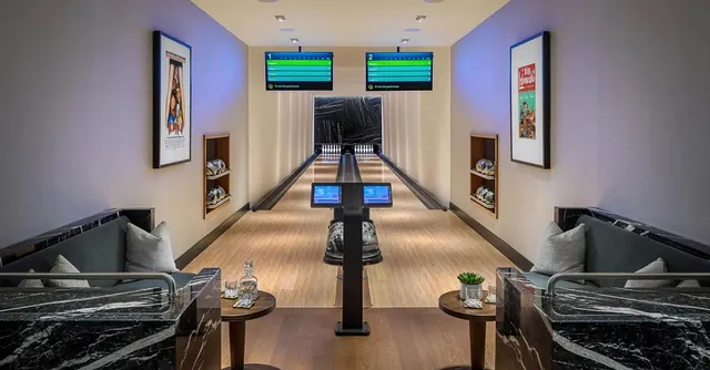 a view of a livingroom with furniture window and brick walls
