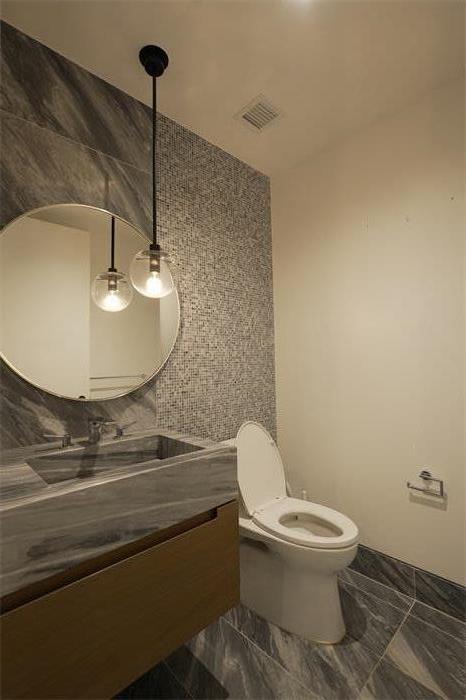 30 Riverside Boulevard, Unit 29D Manhattan, NY 10069 - Photo 9 of 25 a bathroom with a sink and a toilet