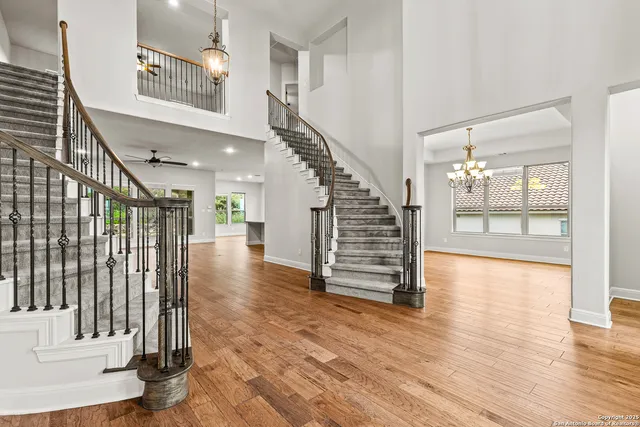 wooden floor with an entryway and livingroom with wooden floor