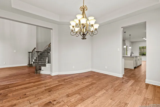 a view of a livingroom with wooden floor