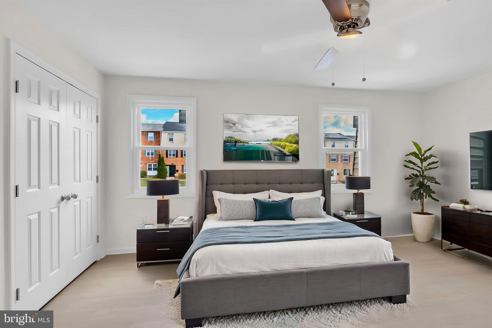 26 Timber Rock Road Gaithersburg, MD 20878 - Photo 13 of 36 a bedroom with a bed and a potted plant