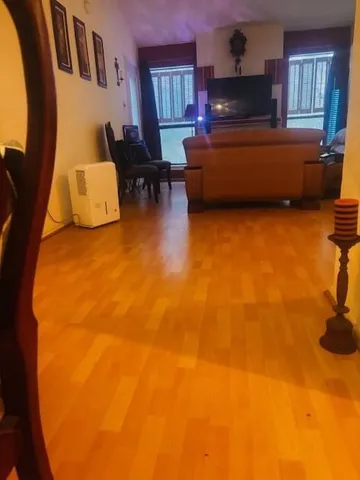 a view of a room with rack on the wall