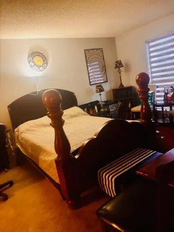 a view of hallway with wooden floor