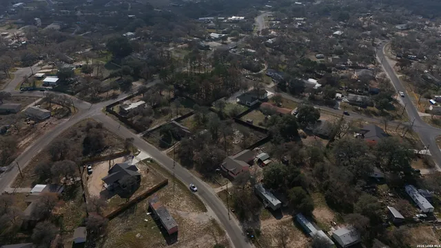 an aerial view of residential house with parking space