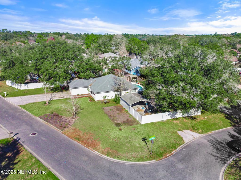 83096 St Mark Drive Yulee, FL 32097 - Photo 30 of 35 an aerial view of a house with outdoor space basket ball court and outdoor seating
