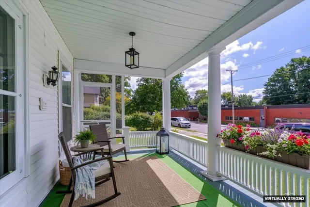 a view of a porch with furniture