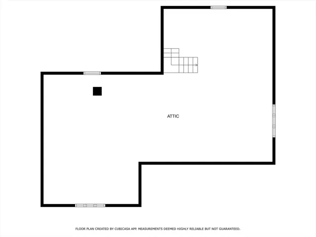 a picture of a room with a close up of a white wall