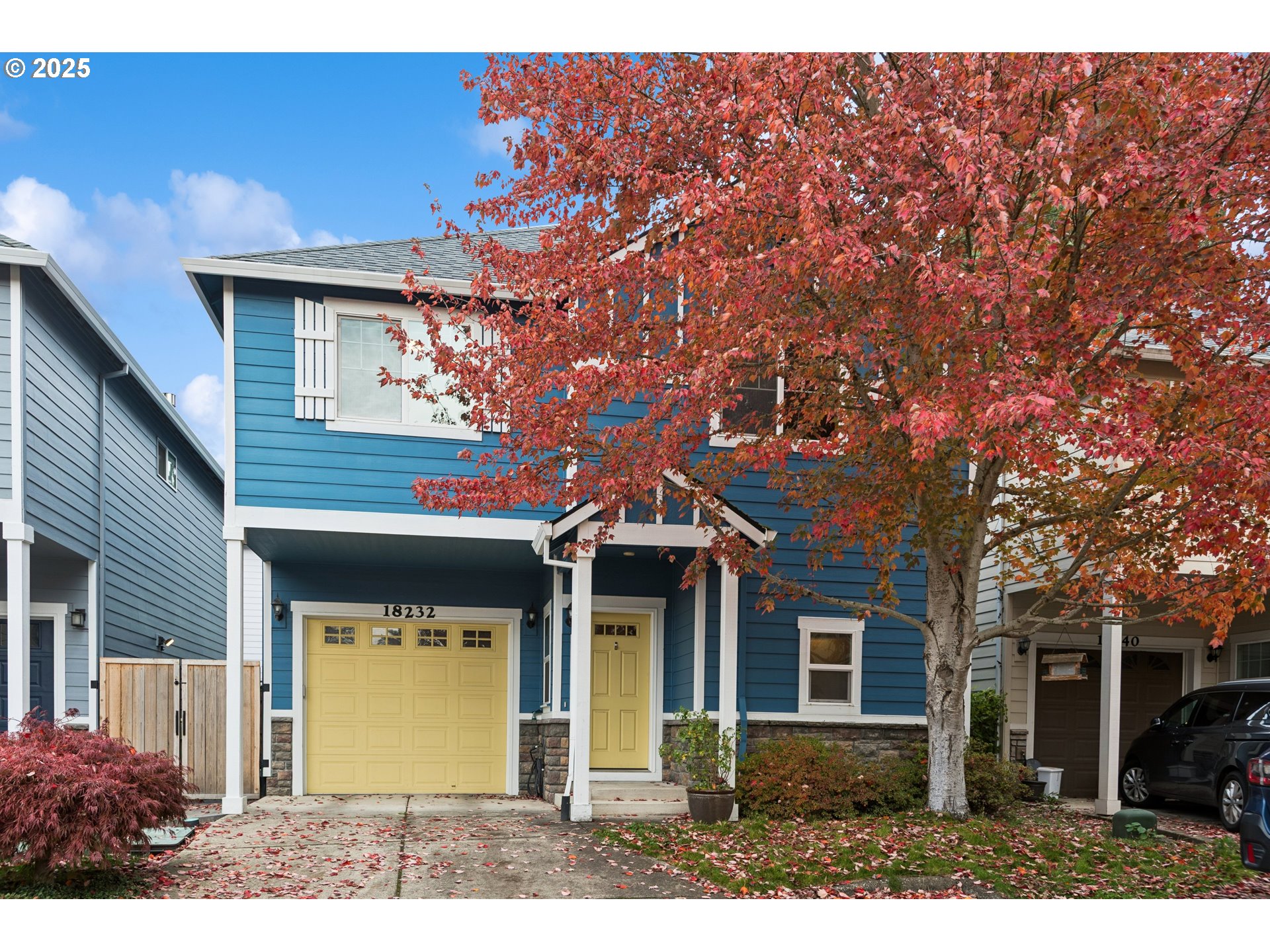 18232 Southwest Orlov Court Beaverton, OR 97078 - Photo 1 of 15 a front view of a house with a garden