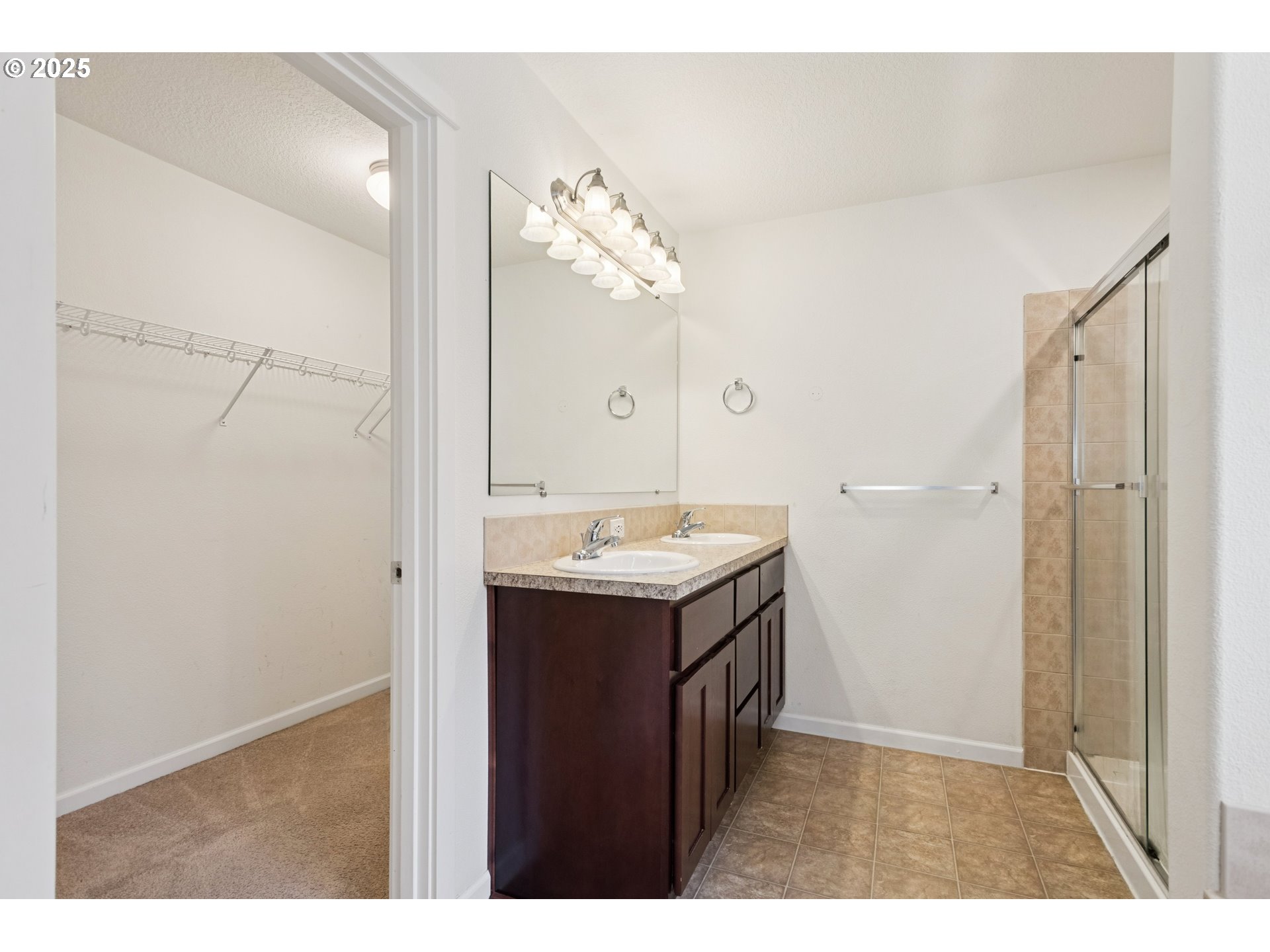 18232 Southwest Orlov Court Beaverton, OR 97078 - Photo 11 of 15 a bathroom with a sink vanity and mirror