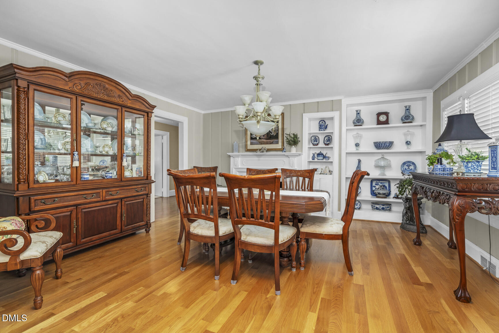 6515 Tonya Road Elm City, NC 27822 - Photo 14 of 52 a dining room with furniture a window and wooden floor