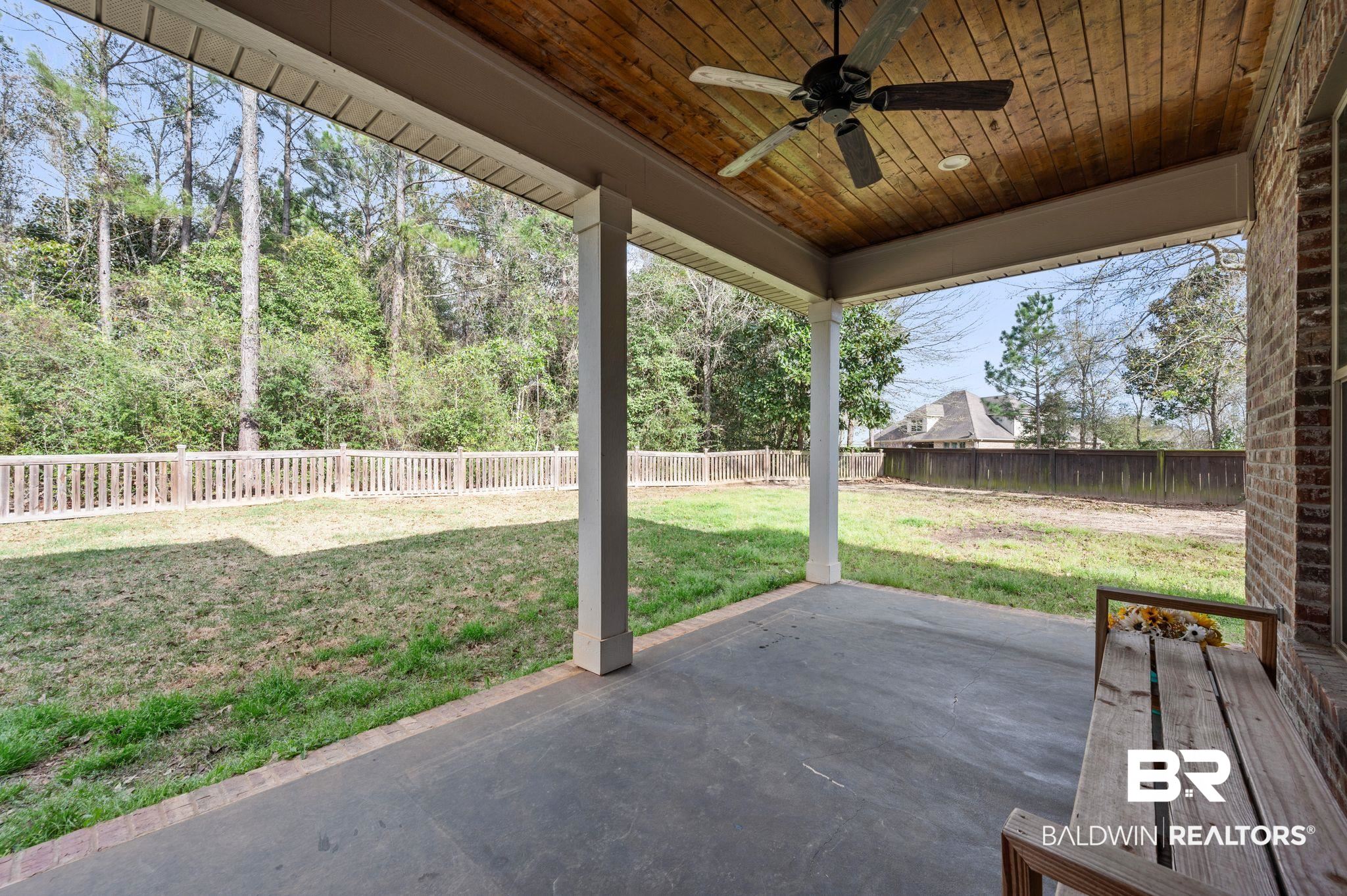 32194 Badger Court Daphne, AL 36527 - Photo 39 of 49 Fenced backyard featuring ceiling fan and a patio