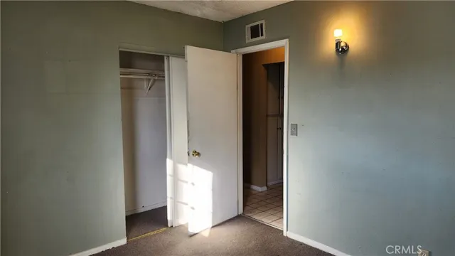 a view of a livingroom with a white door