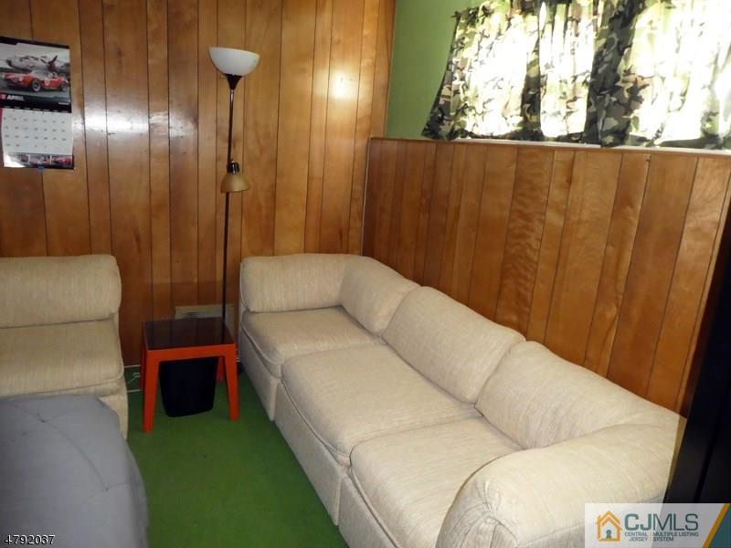 4 Lexington Road Somerset, NJ 08873 - Photo 13 of 14 a living room with furniture