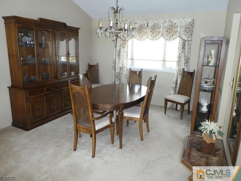 4 Lexington Road Somerset, NJ 08873 - Photo 3 of 14 a dining room with furniture and window
