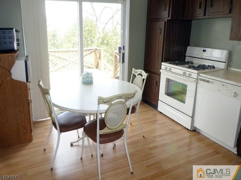 4 Lexington Road Somerset, NJ 08873 - Photo 4 of 14 a view of a dining room with furniture window and outside view