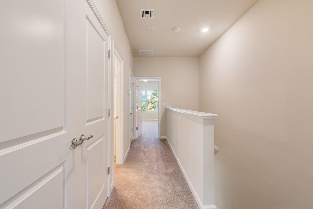 1841 Southeast Roxy Way Southeast Stuart, FL 34996 - Photo 20 of 32 Hallway to 2nd/3rd Bedrooms