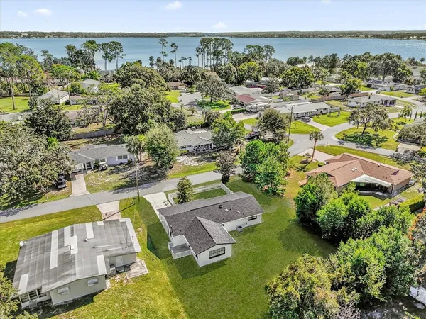 an aerial view of a house with a garden