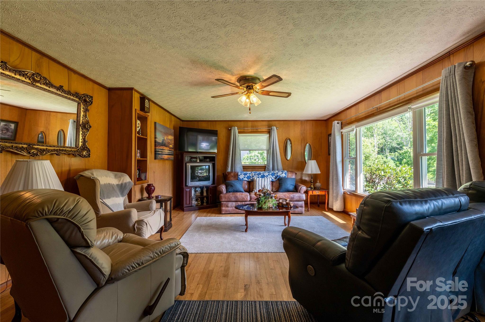 40 Double Island Road Burnsville, NC 28714 - Photo 6 of 28 a living room with furniture and a large window