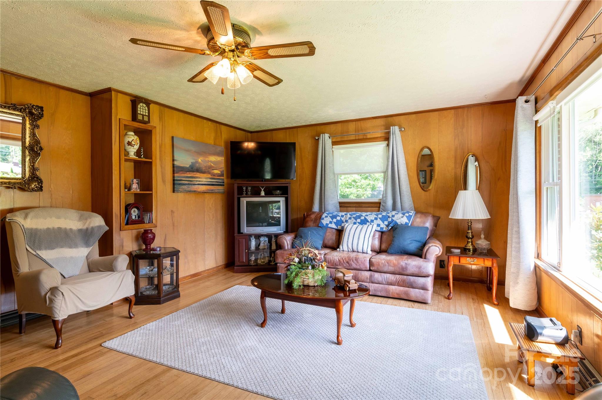 40 Double Island Road Burnsville, NC 28714 - Photo 7 of 28 a living room with furniture and a chandelier