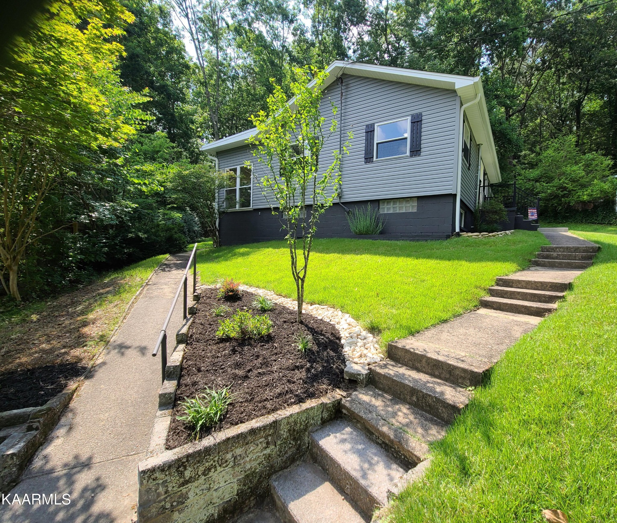 121 Taylor Road Oak Ridge, TN 37830 - Photo 50 of 50 a view of a house with backyard and garden
