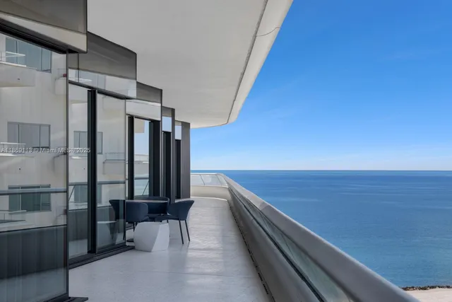 a view of balcony with furniture