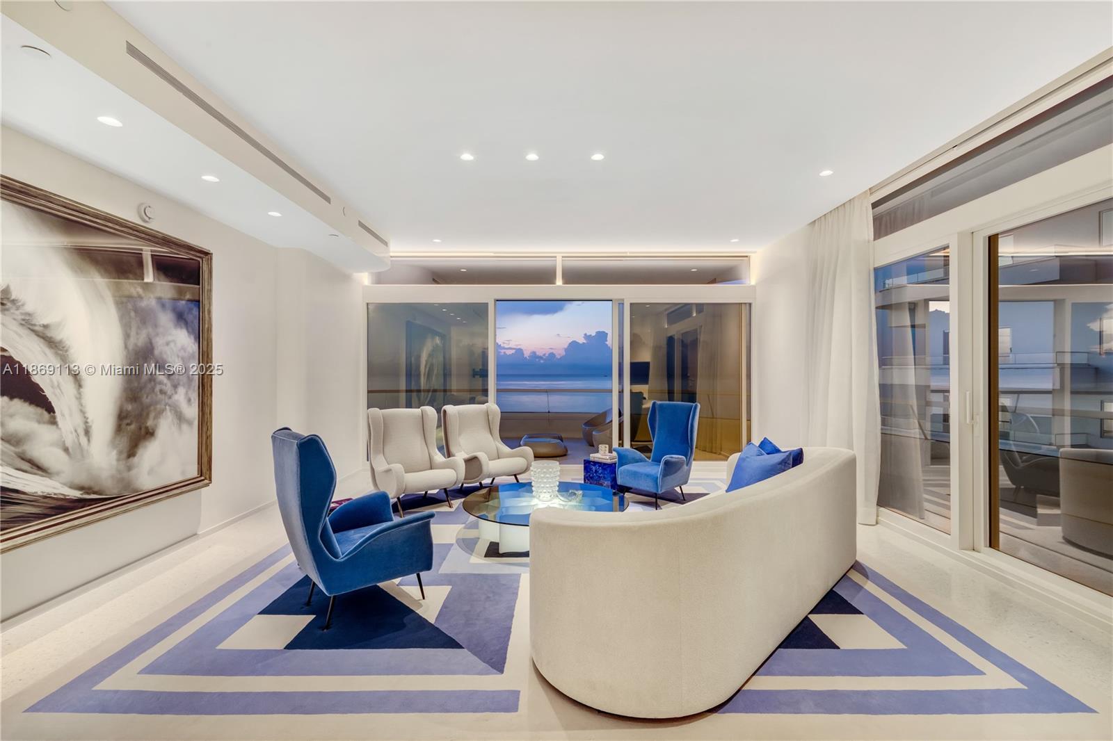 3315 Collins Avenue, Unit 10B Miami Beach, FL 33140 - Photo 32 of 42 a living room with furniture and window