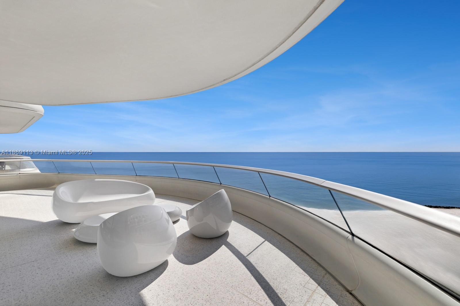 3315 Collins Avenue, Unit 10B Miami Beach, FL 33140 - Photo 4 of 42 a view of table and chair