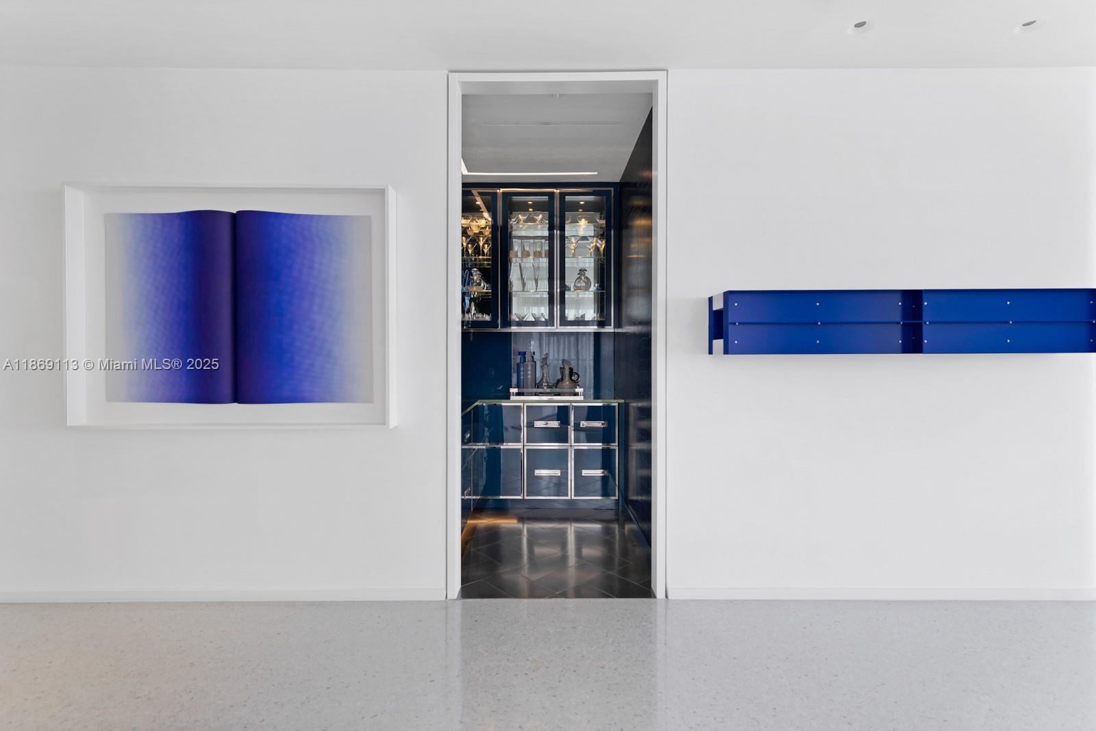 3315 Collins Avenue, Unit 10B Miami Beach, FL 33140 - Photo 9 of 42 a view of cabinet and window