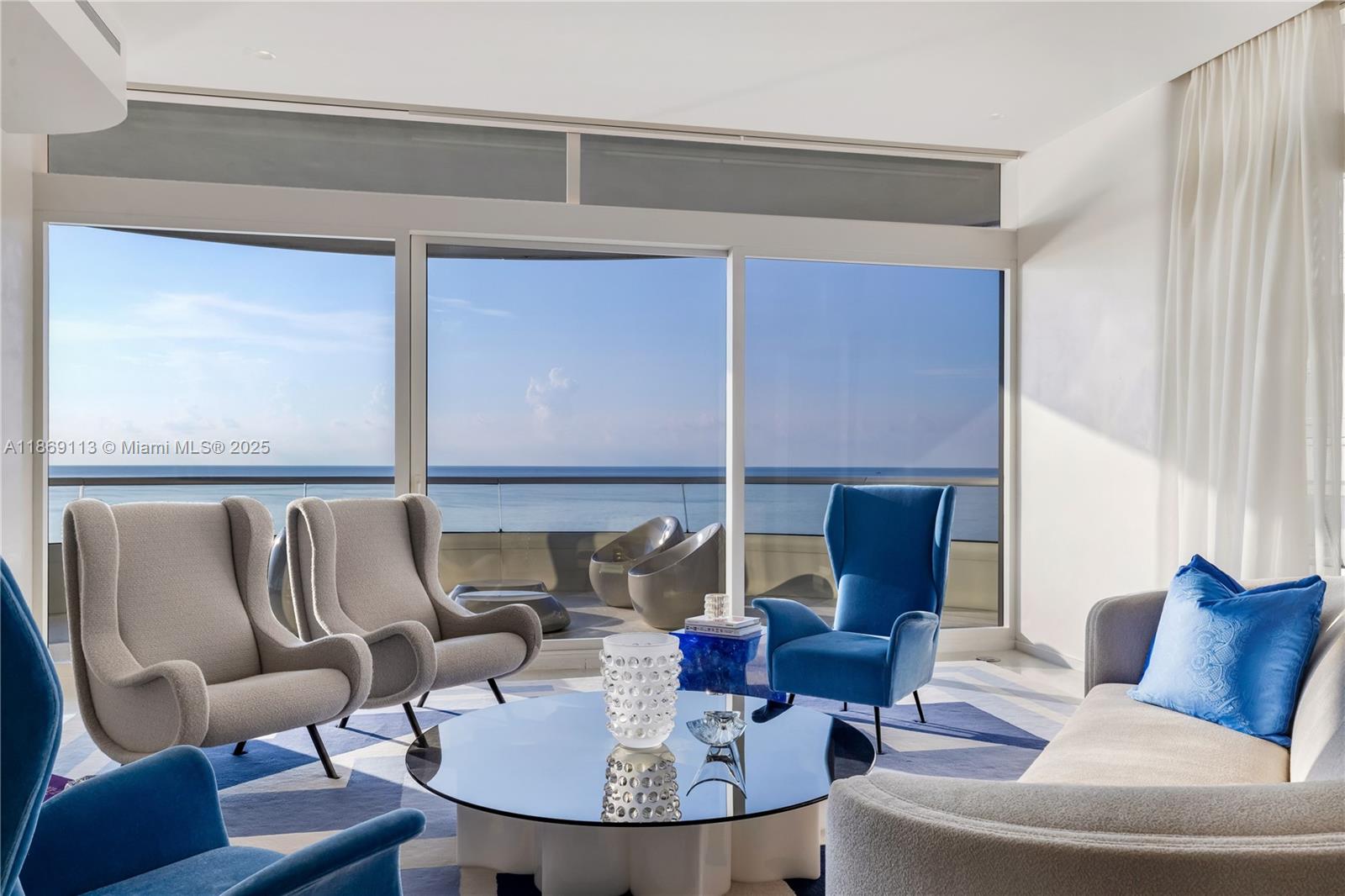 3315 Collins Avenue, Unit 10B Miami Beach, FL 33140 - Photo 10 of 42 a living room with furniture