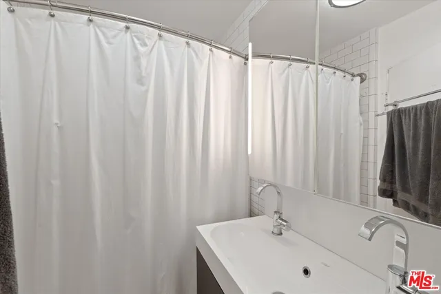 a bathroom with a sink and a tub