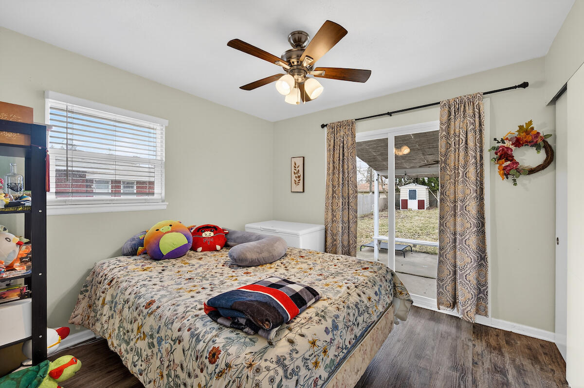 24 Oregon Street Racine, WI 53405 - Photo 13 of 30 Bedroom with sliding door walkout to backyard patio area