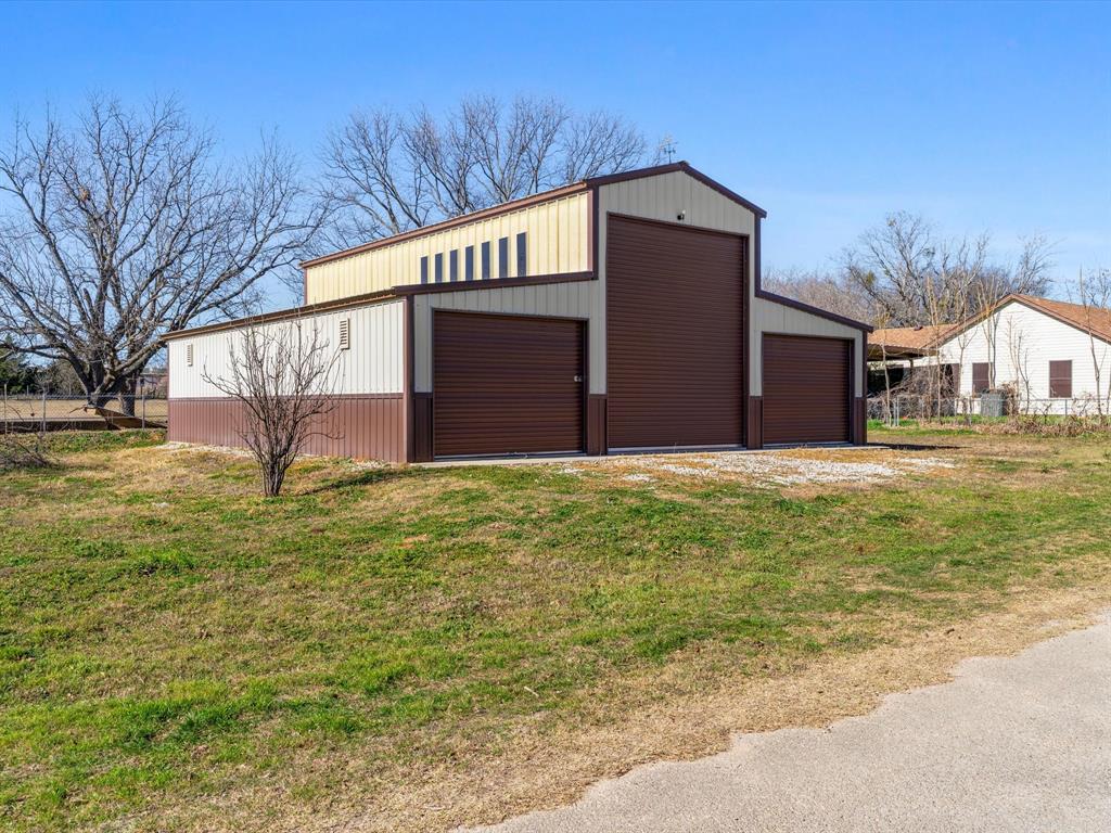 Tbd South Ewing Street Boyd, TX 76023 - Photo 2 of 24 a view of a house with a yard